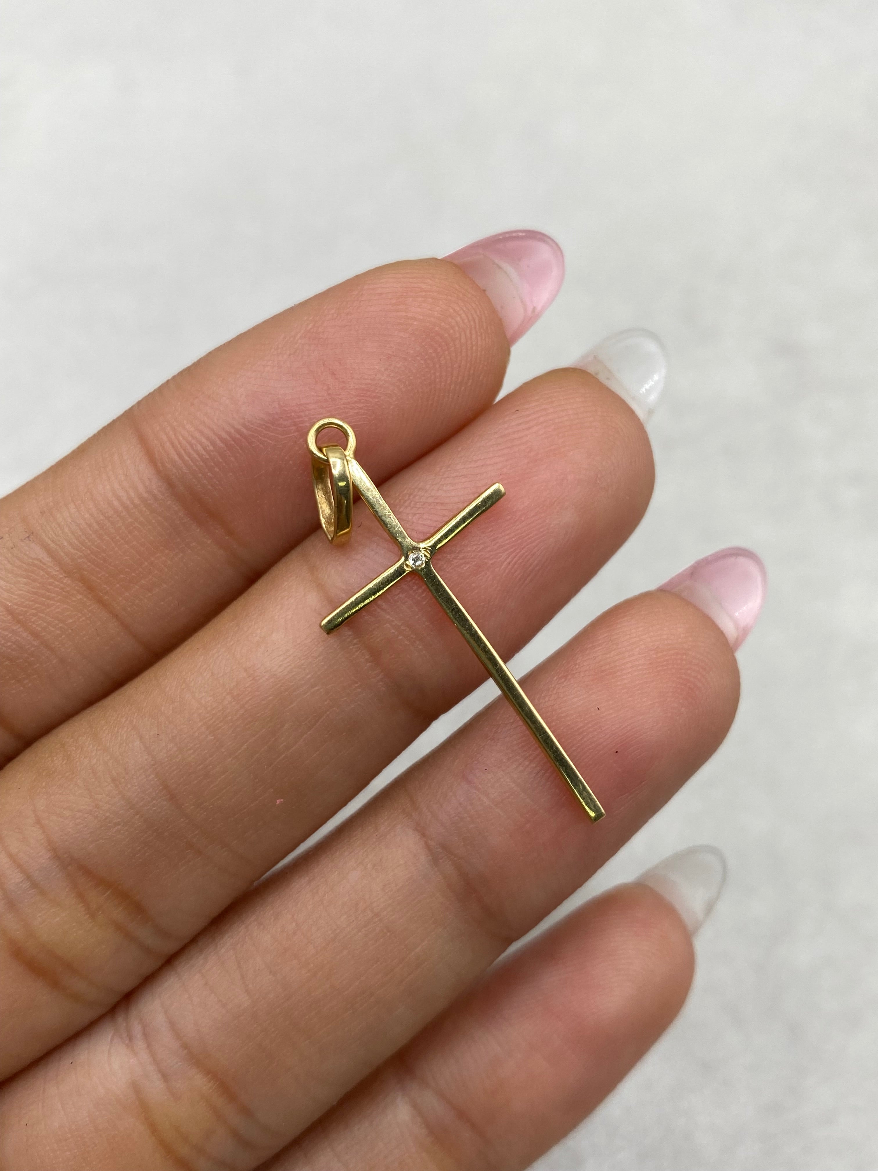 Dije cruz circon centro blanco (R) Oro amarillo 18k 0,74 Gr / 14,34 mm / 3,5 Cm