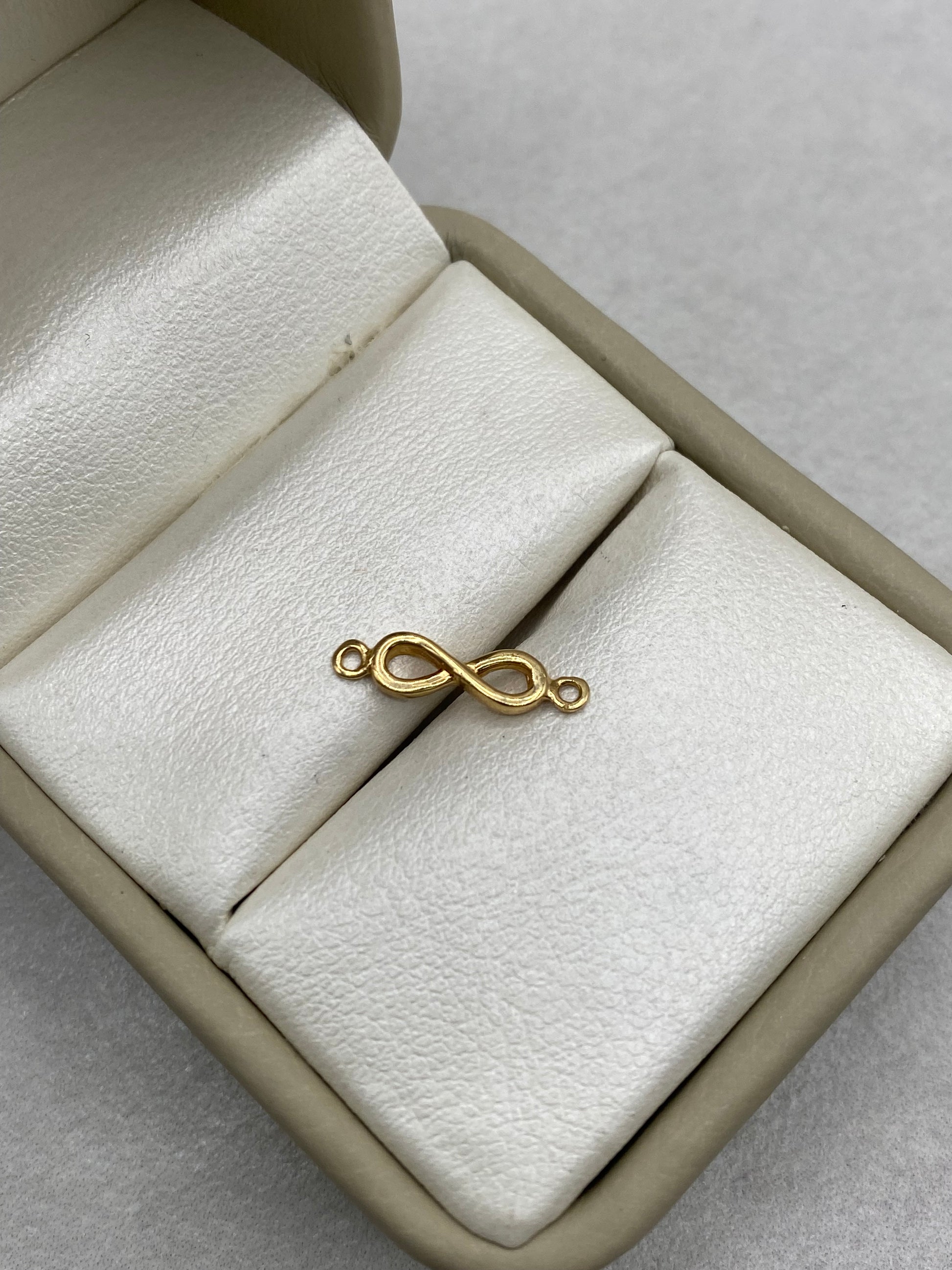 Herraje infinito (R) Oro amarillo 18k 0,53 Gr / 1,5 Cm