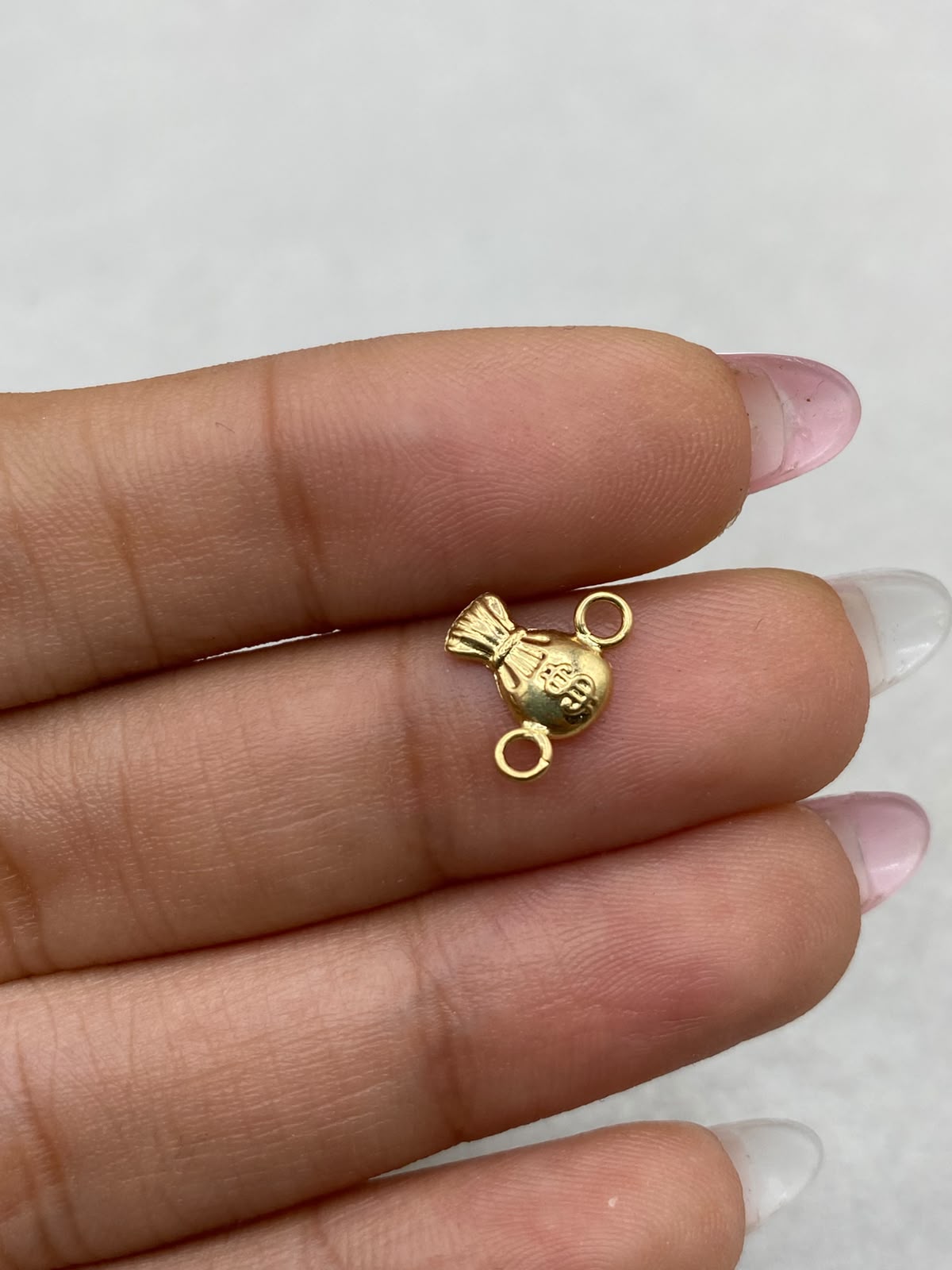 Herraje Bolsa De Dinero Oro amarillo 18k 0,22 Gr / 1,1 Cm