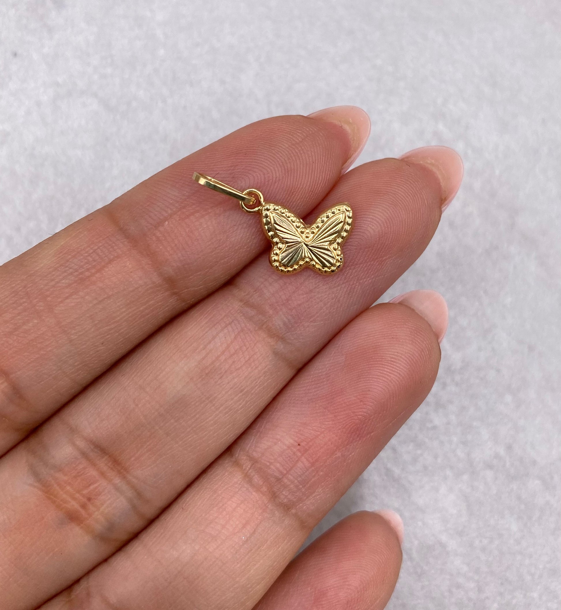 Dije Mariposa Fondo Estrellado 0,45 Gr / 1,80 Cm