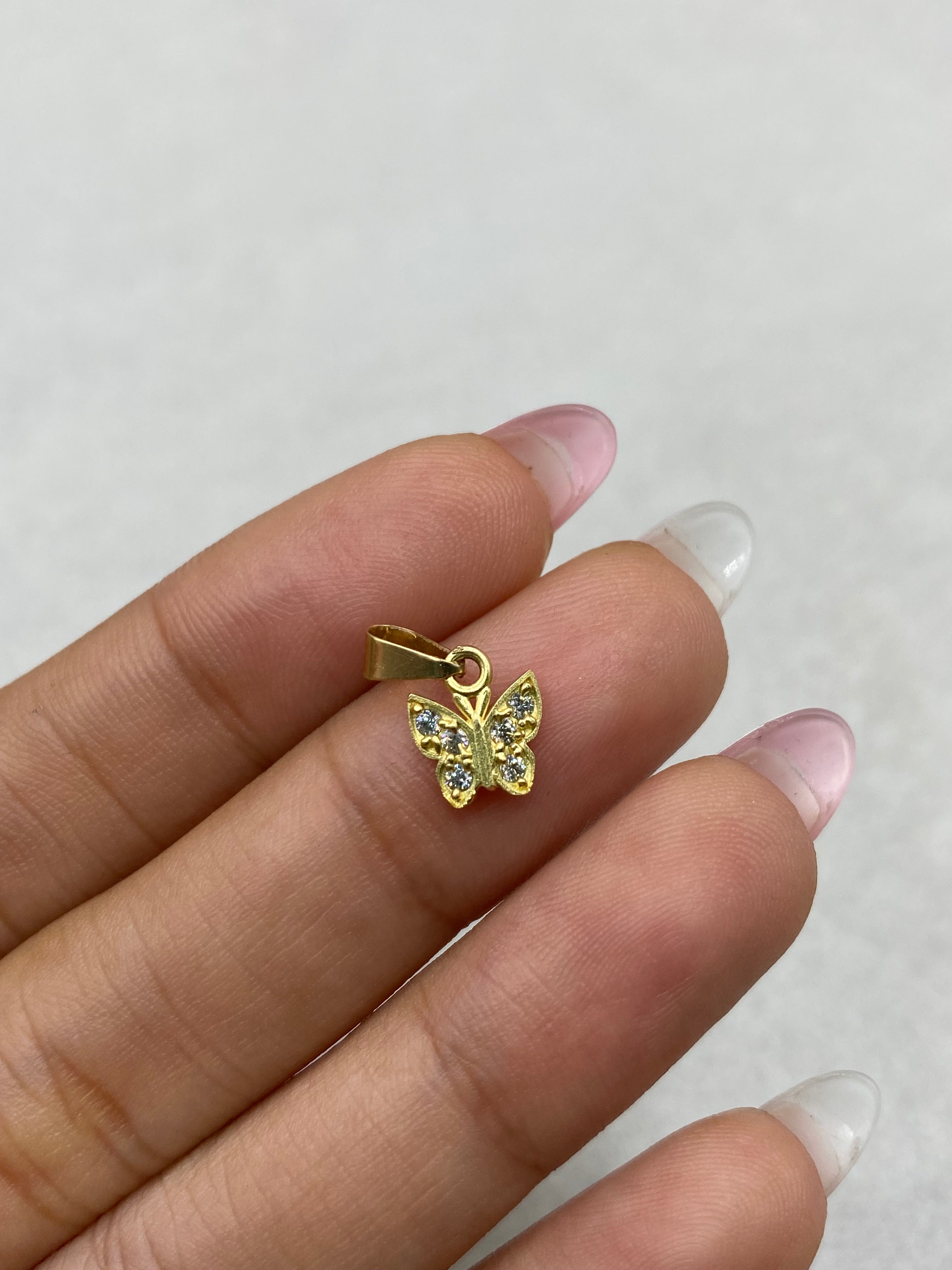 Dije mariposa circones blancos (R) Oro amarillo 18k 0,66 Gr / 7,70 mm / 1,0 Cm