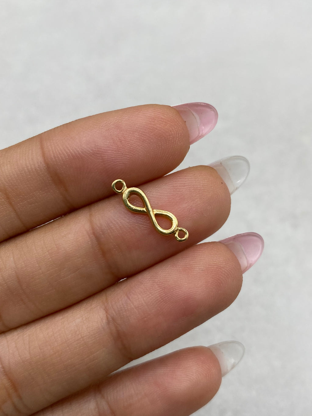 Herraje infinito (R) Oro amarillo 18k 0,53 Gr / 1,5 Cm