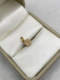 Dije flor circones blancos centro fucsia (R) Oro amarillo 18k 0,59 Gr / 6,78 mm / 1,5 Cm