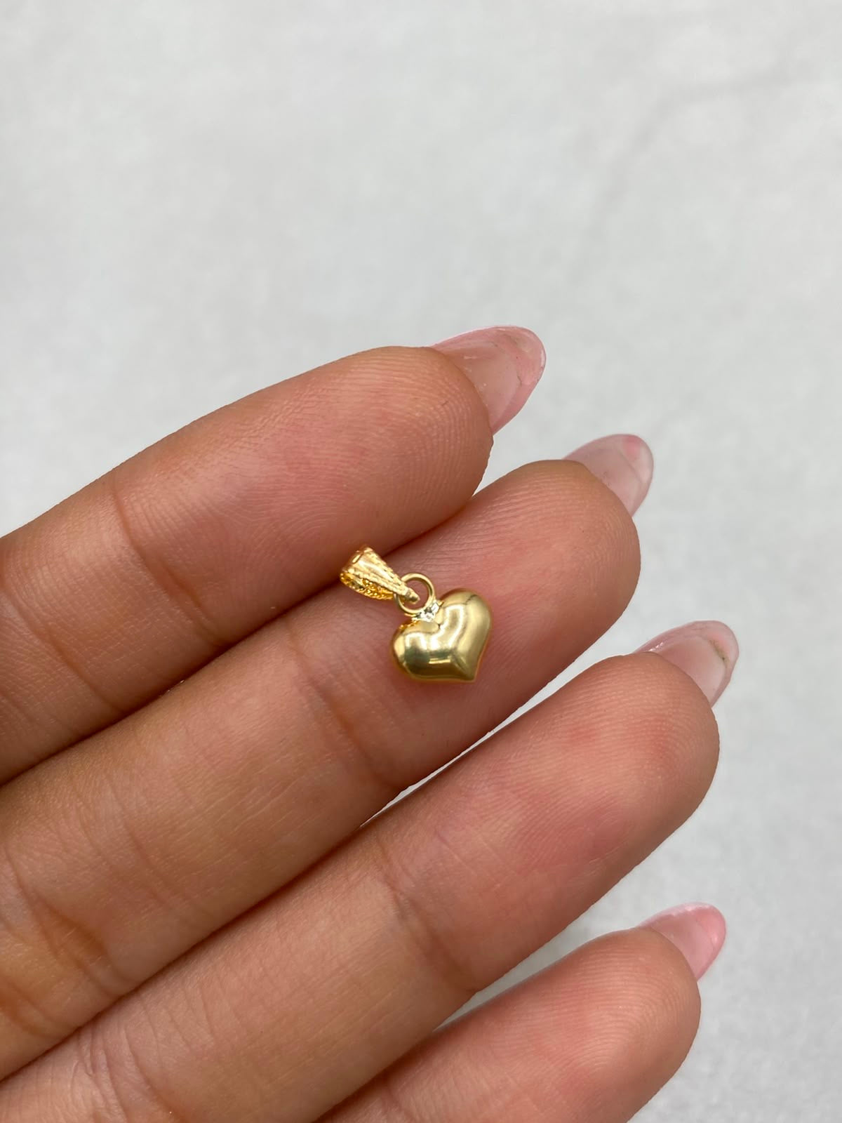 Dije corazon inflado Oro amarillo 18k 0,26 Gr / 7,15 mm / 1,5 Cm