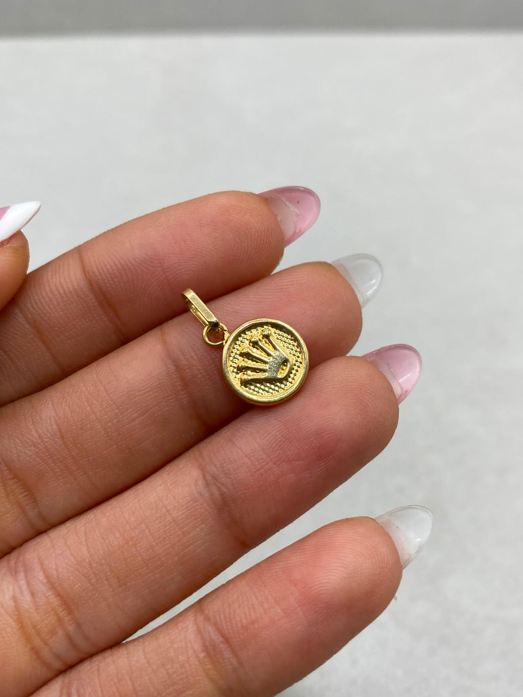 Dije Corona RX Oro amarillo 18k 0,5 Gr / 1,8 Cm
