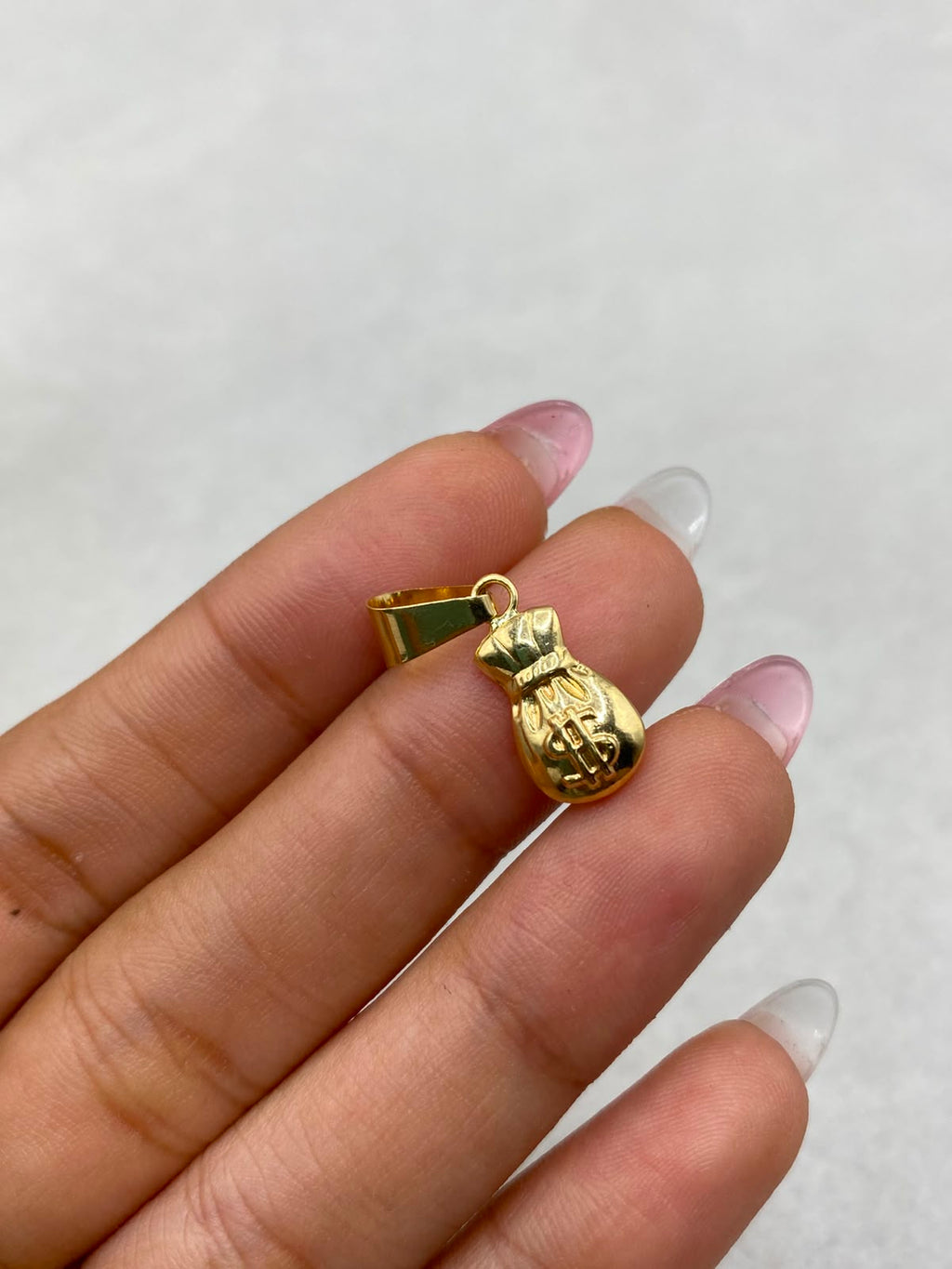 Dije bolsa de dinero Oro amarillo 18k 0,74 Gr / 8 mm / 3 Cm