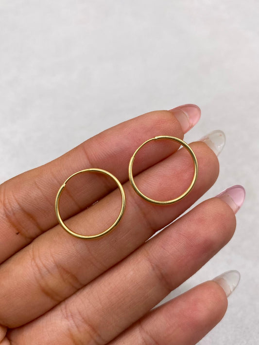 Candonga imperdible lisa (r) Oro amarillo 18k 0,60 Gr / 2,0 Cm