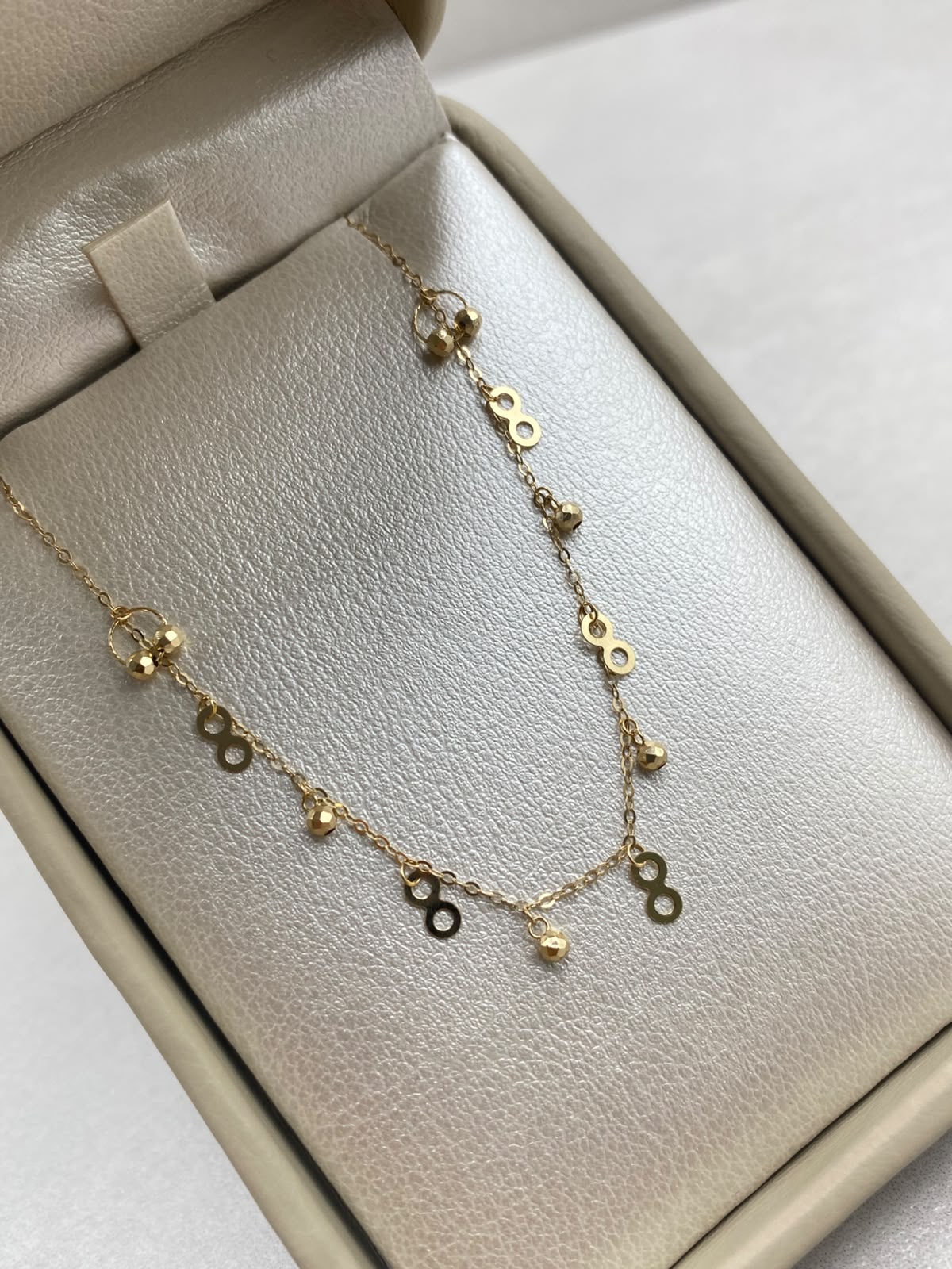 Cadena It aro seguido con dijes infinitos y balines diamantados  Oro amarillo 18k +3 / 0,96 Gr / 1,0 mm / 45 Cm