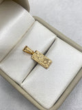 Dije one dollar  Oro amarillo 18k 0,64 Gr / 6 mm / 2,2 Cm
