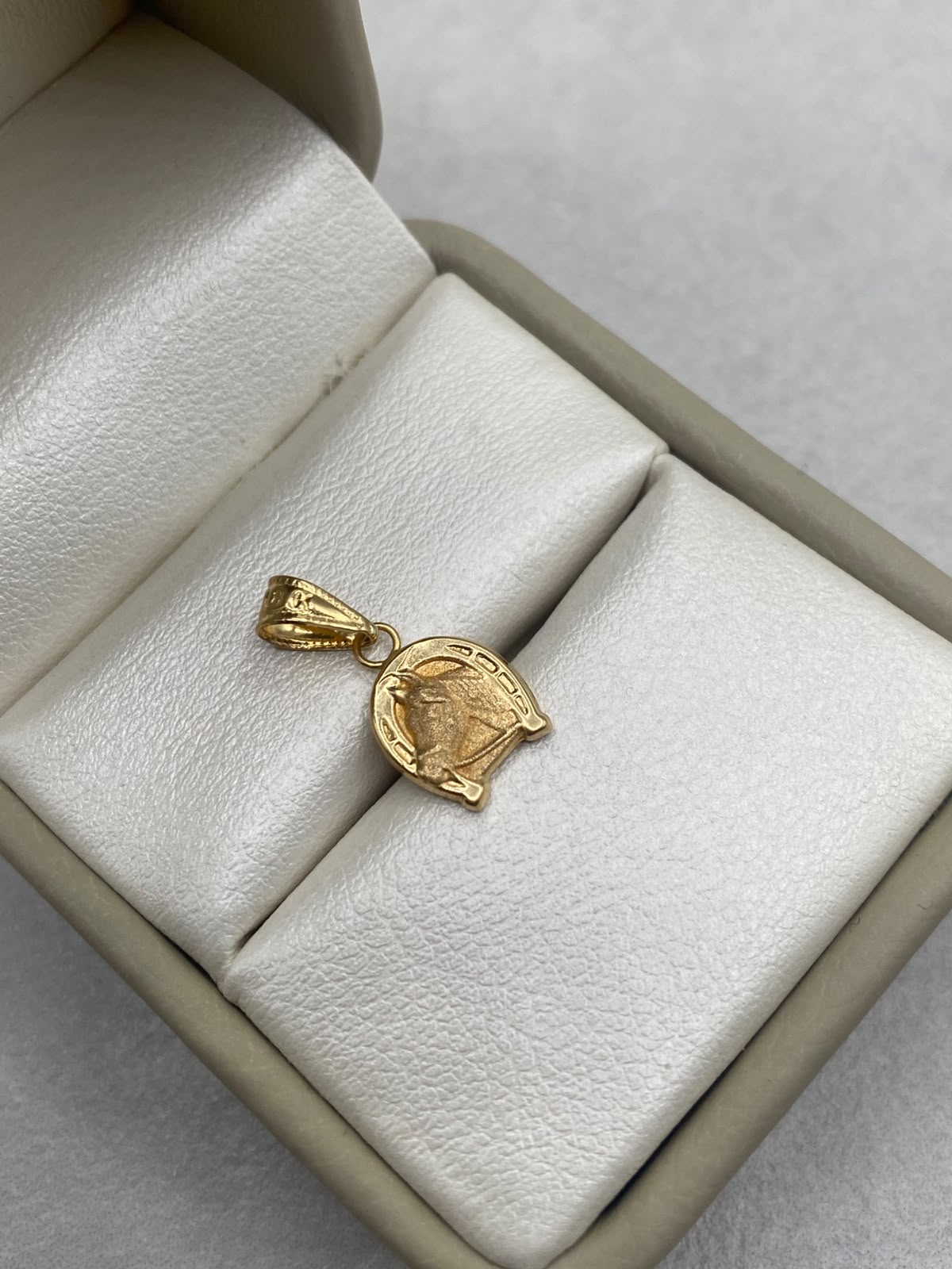 Dije herradura de caballo Oro amarillo 18k 0,64 Gr / 1,1 Cm
