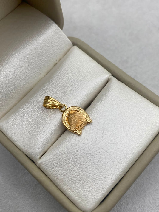 Dije herradura de caballo Oro amarillo 18k 0,64 Gr / 1,1 Cm