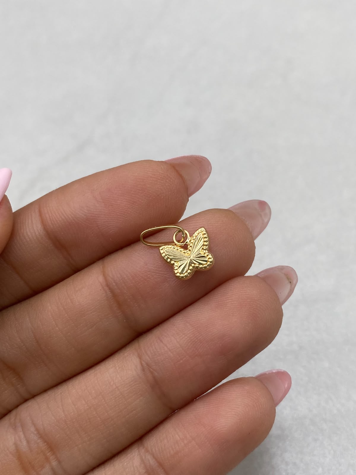 Dije mariposa diamantada Oro amarillo 18k 0,28 Gr / 8,23 mm / 2,0 Cm