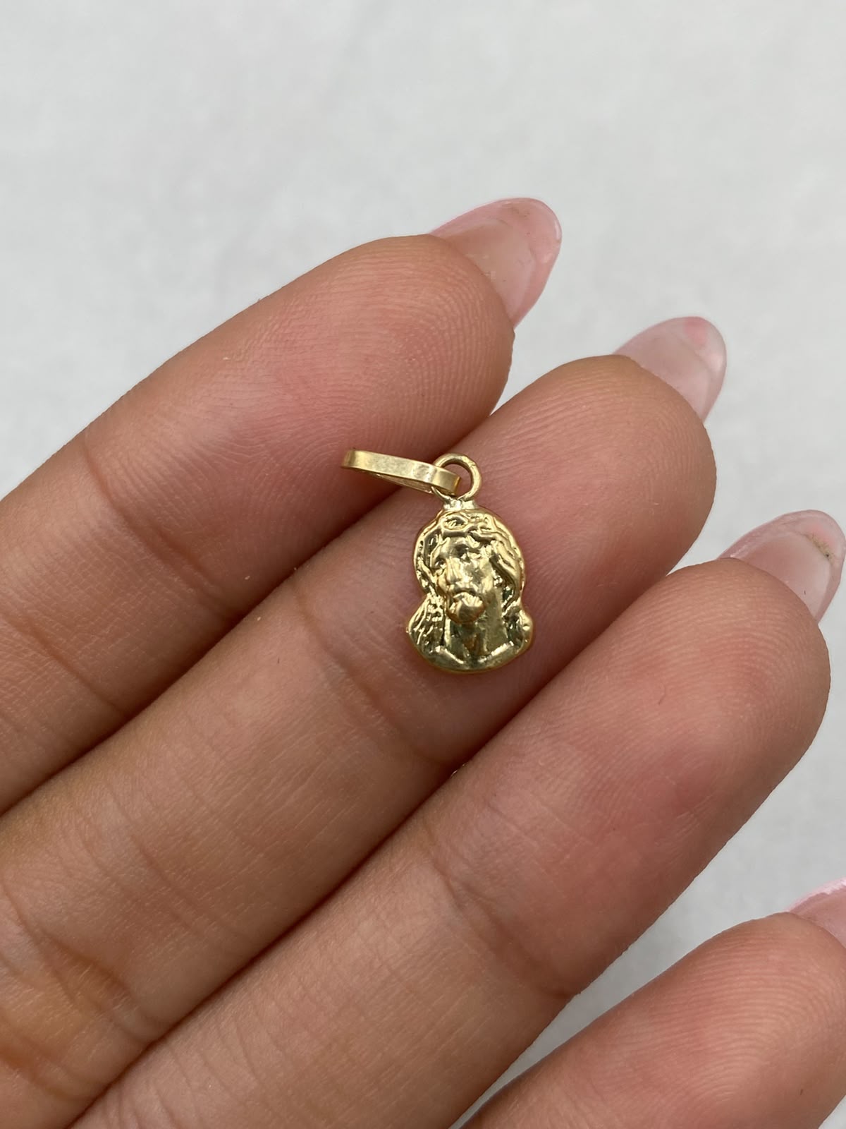 Dije jesucristo Oro amarillo 18k 0,34 Gr / 7,11 mm / 2,0 Cm