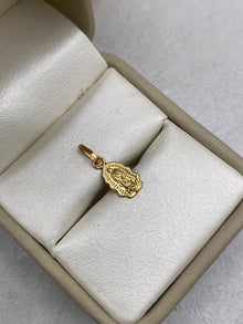Dije silueta virgen de guadalupe  Oro amarillo 18k 0,36 Gr / 7,38 mm / 2,5 Cm
