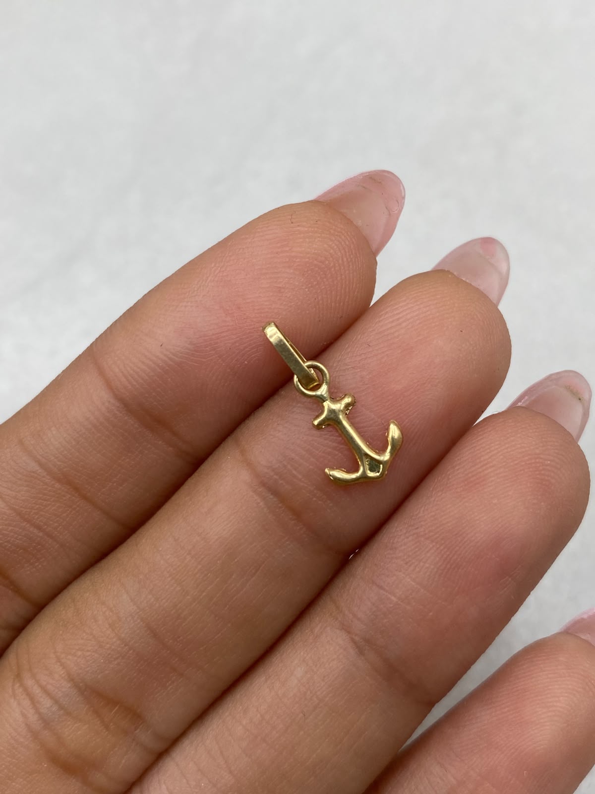 Dije ancla Oro amarillo 18k 0,24 Gr / 6,89 mm / 2,0 Cm