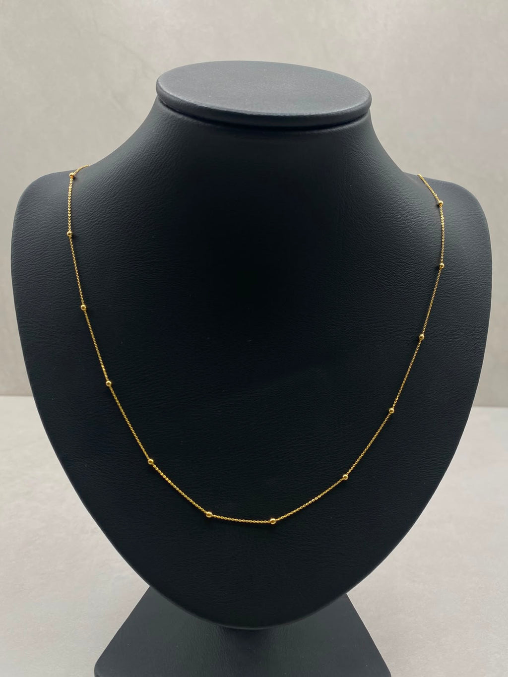 Cadena aro seguido con balines lisos  Oro amarillo 18k 1,55 Gr / 1,0 mm / 45 Cm