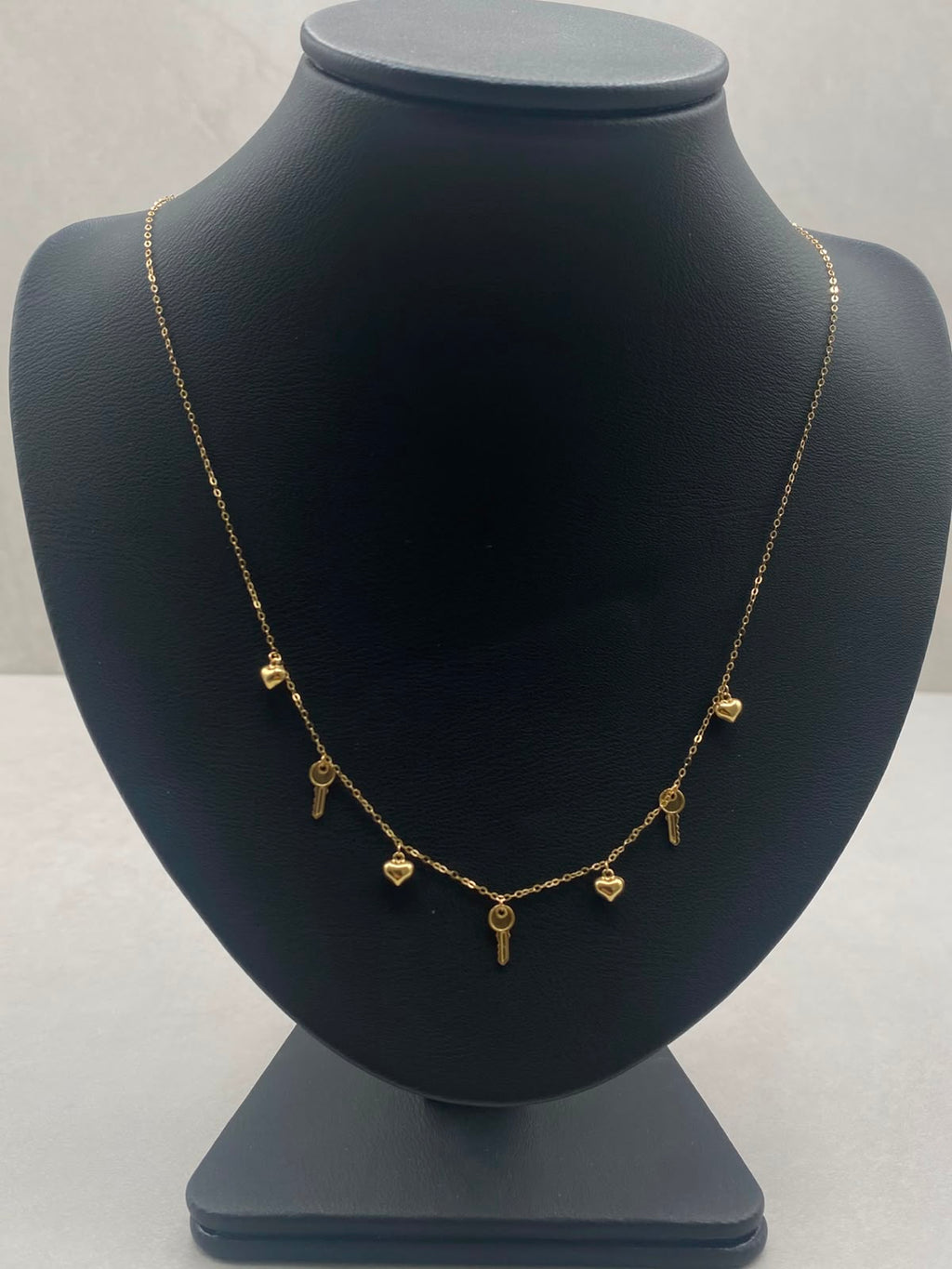 Cadena It aro seguido con dijes corazon y llaves  Oro amarillo 18k +3 / 1,46 Gr / 1,0 mm / 45 Cm